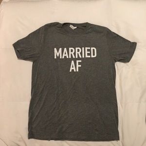 His and hers matching “married AF” shirts